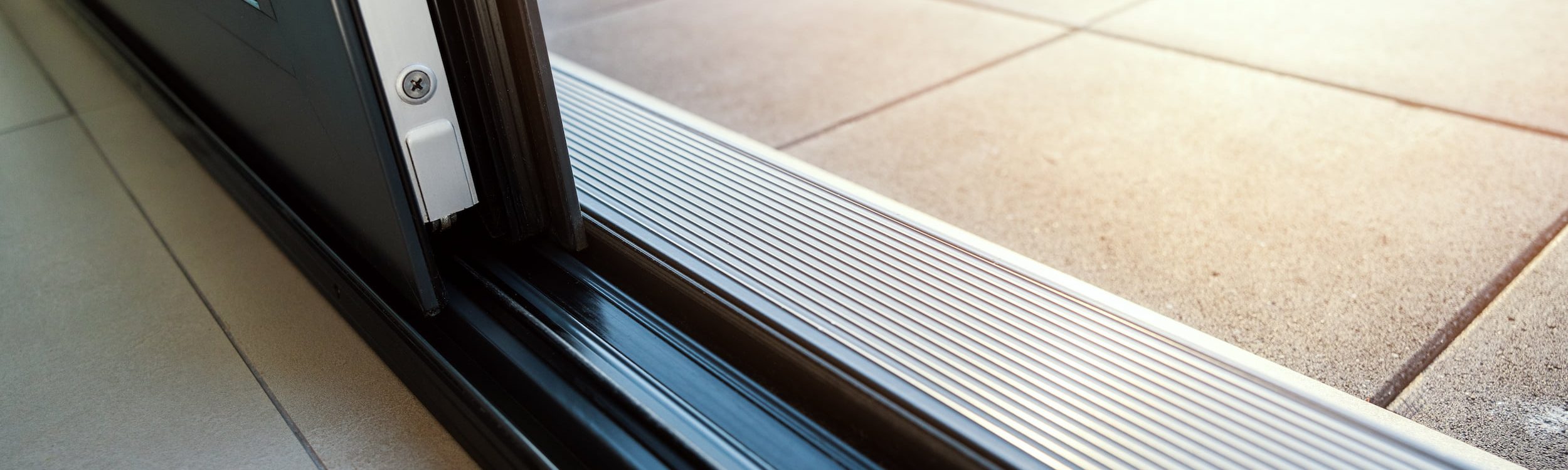 Black aluminium sliding patio doors for a home in Oxford.
